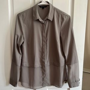 Gray button down collared shirt